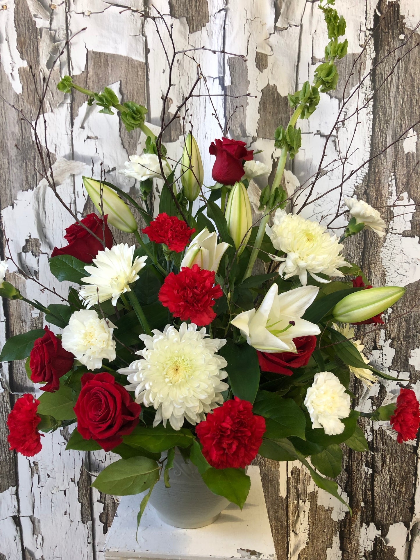 Forever in Paradise sympathy flower arrangement