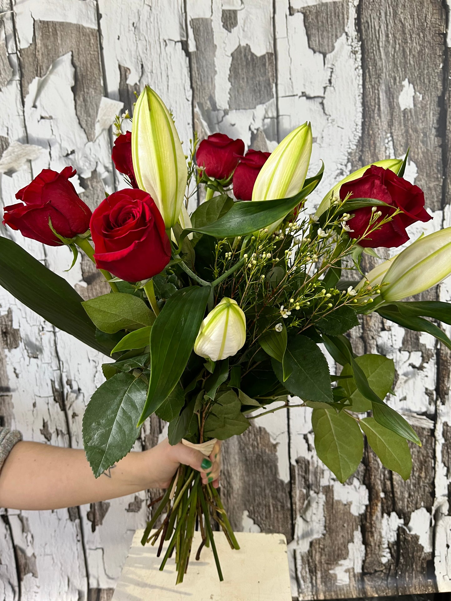 Red roses and white Lilly bouquet