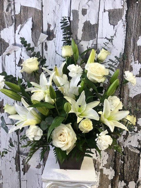Purity funeral flower arrangement
