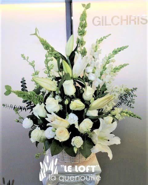 Serenity funeral basket flower arrangement