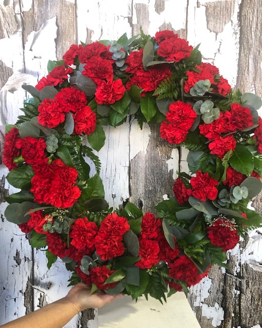 Luscious red carnation & eucalyptus wreath