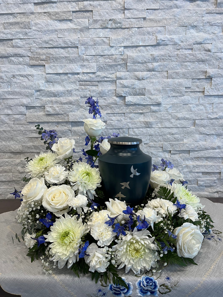 Blue and white urn flower arrangement
