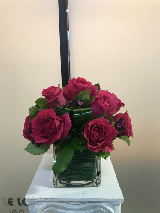 Arrangement de roses rose vif