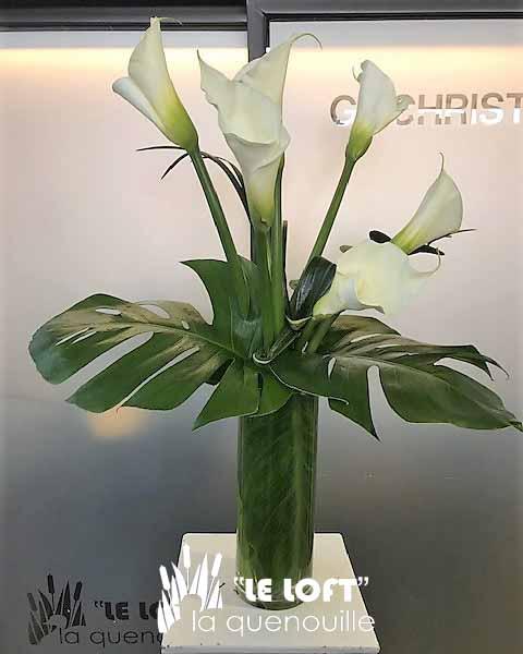 Calla lilies in a vase arrangement