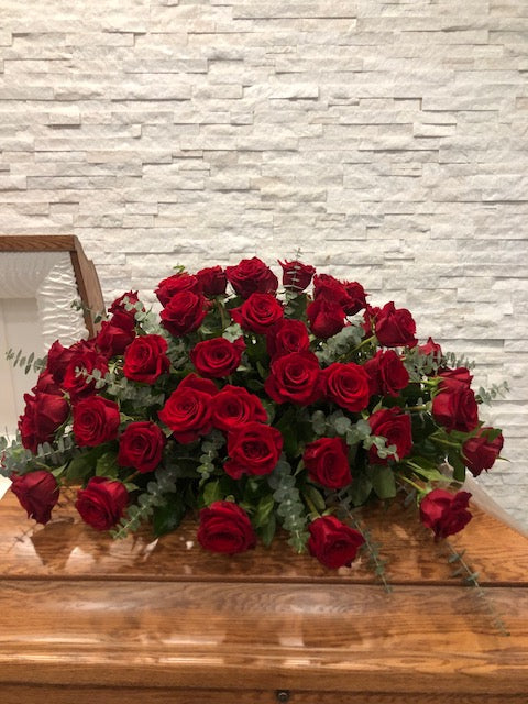 Red Roses & Eucalyptus Casket Spray - florist La Quenouille